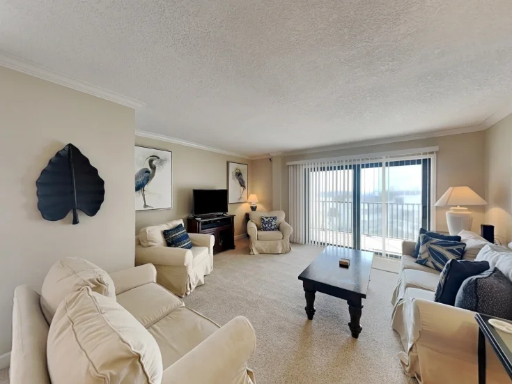 Bright and inviting living room at 405 The Bent Palm Club